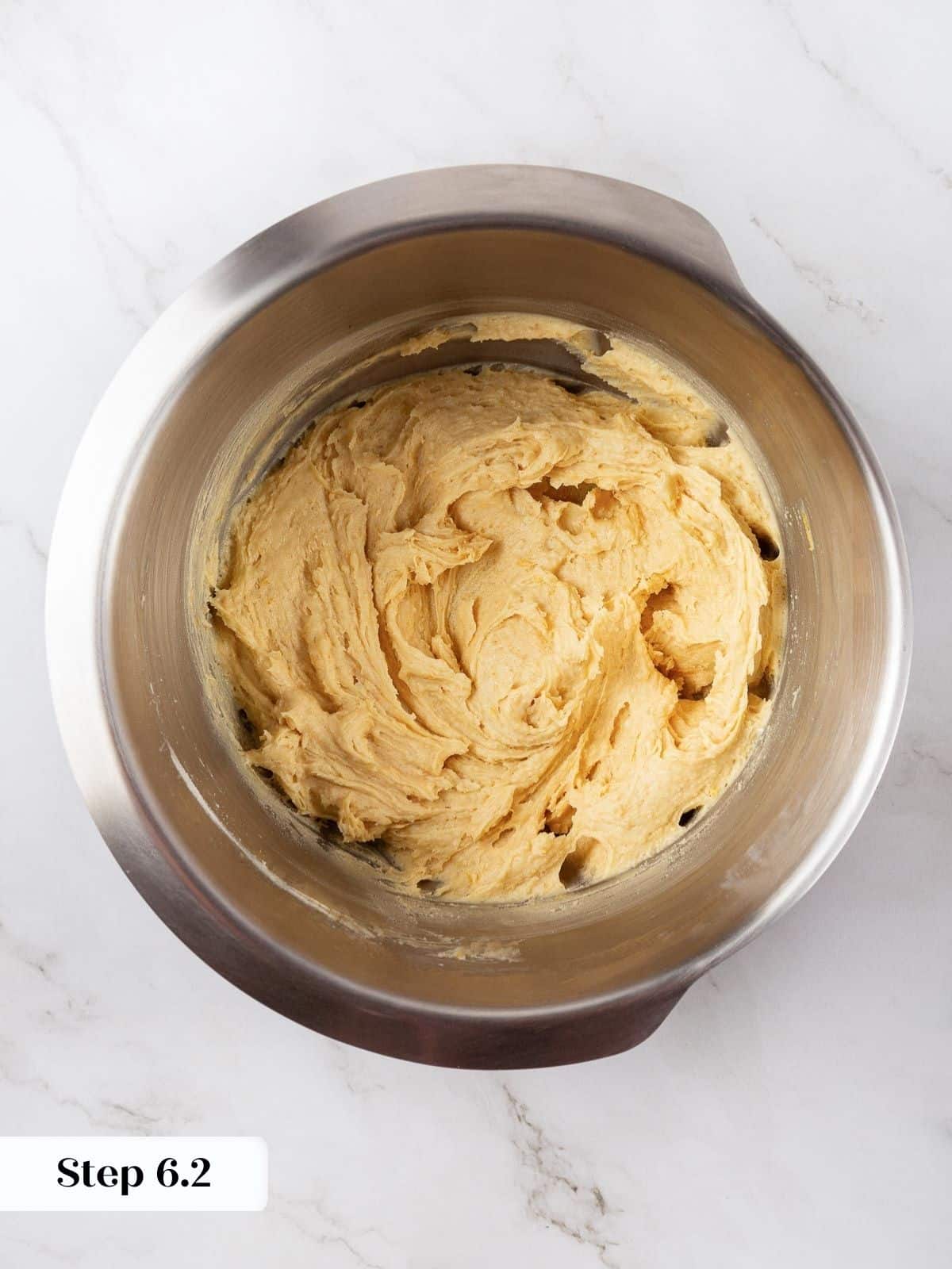 Thick cookie dough with no dry streaks, ready for the next step.