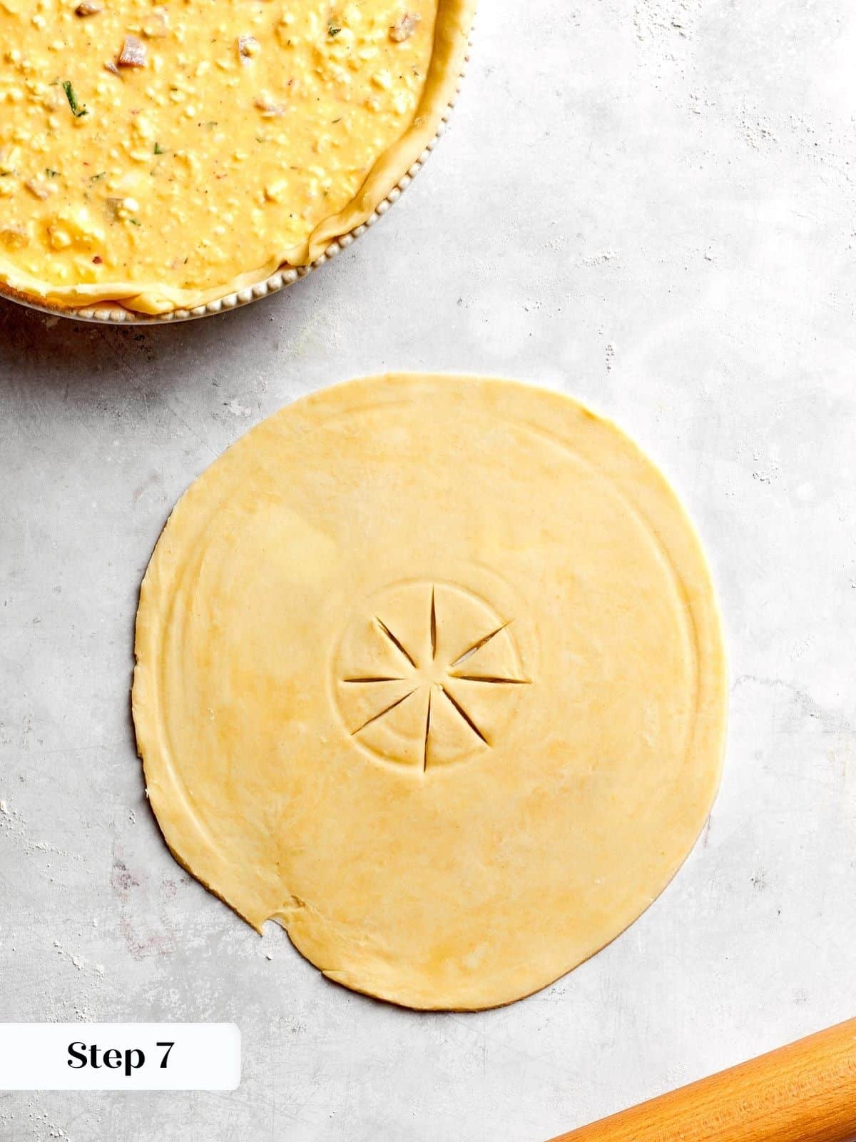 A pie crust with slits to allow steam to escape during baking.