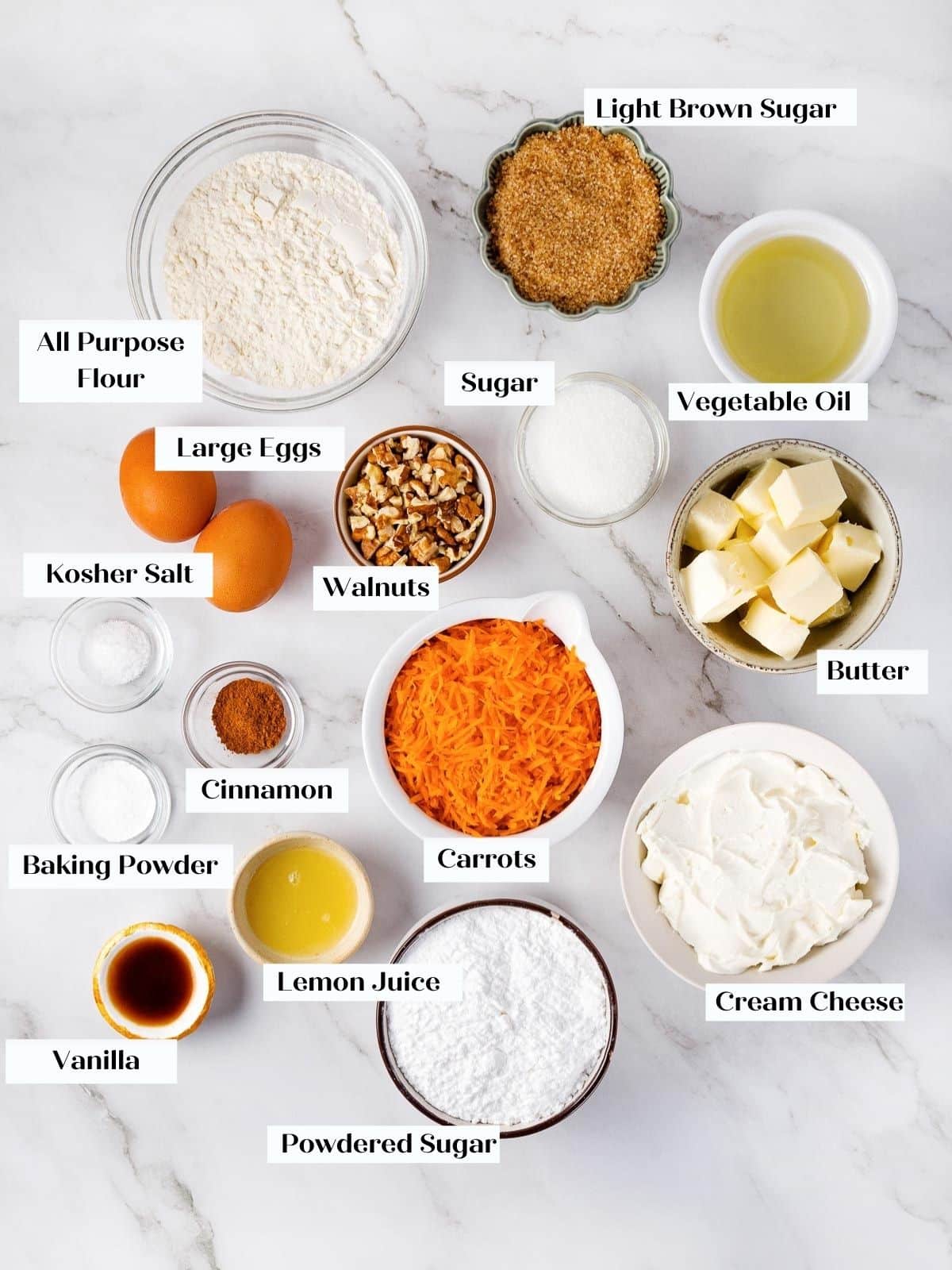 All ingredients for carrot cake cupcakes laid out on the counter.