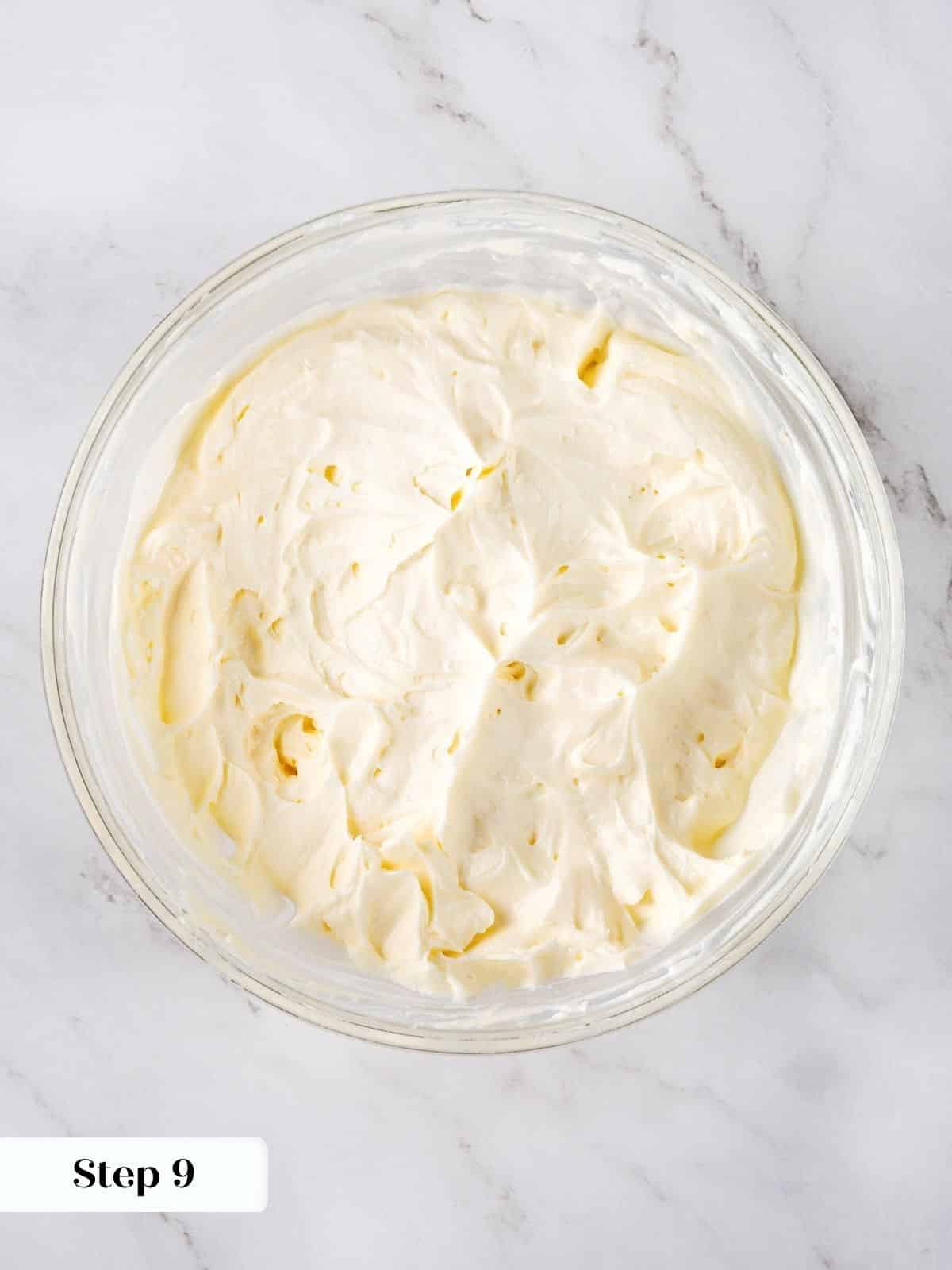 Smooth and fluffy buttercream waiting to be piped on cupcakes.