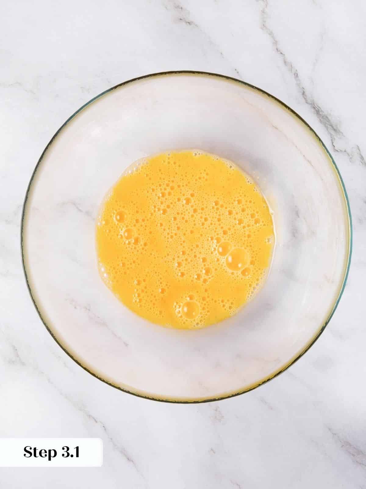 Smoothly beaten eggs before adding oil and sugar.