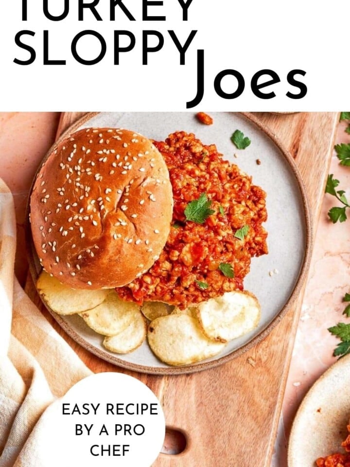 A family-style dinner table with turkey sloppy joes and side of chips.