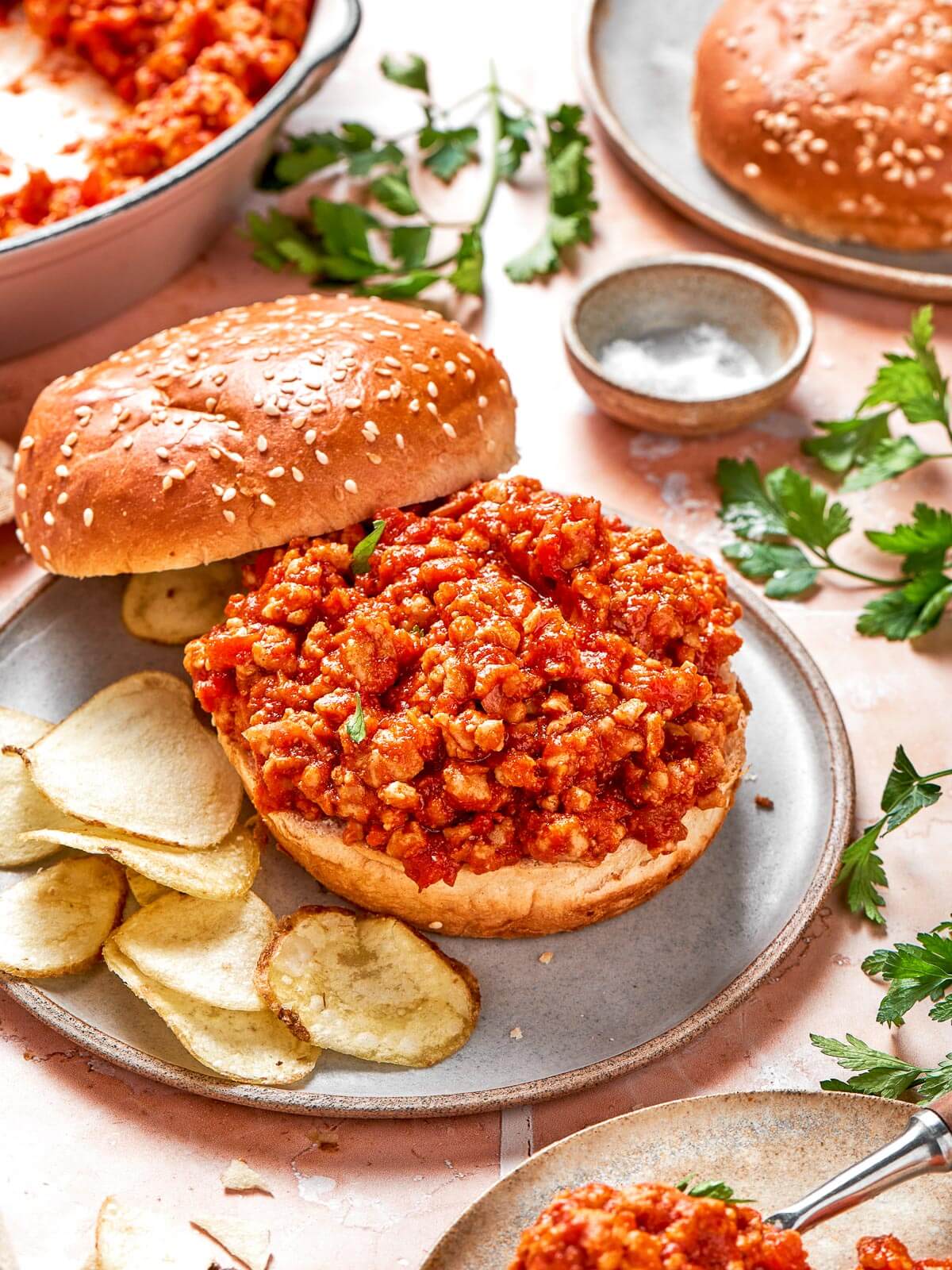 Serving up turkey sloppy joes for the table.