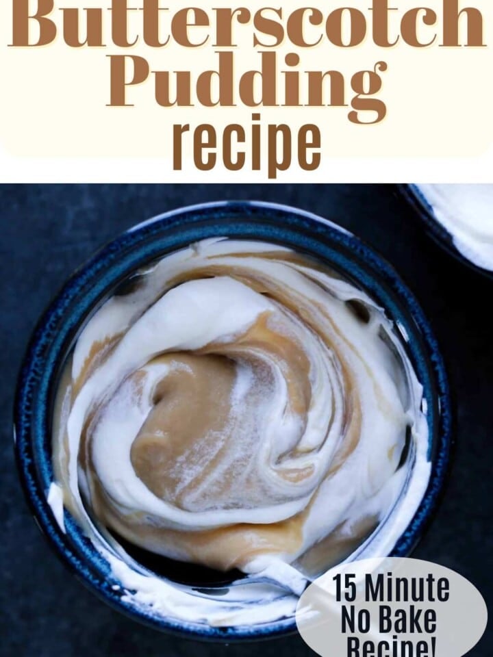 Close-up of pudding with swirled whipped topping.