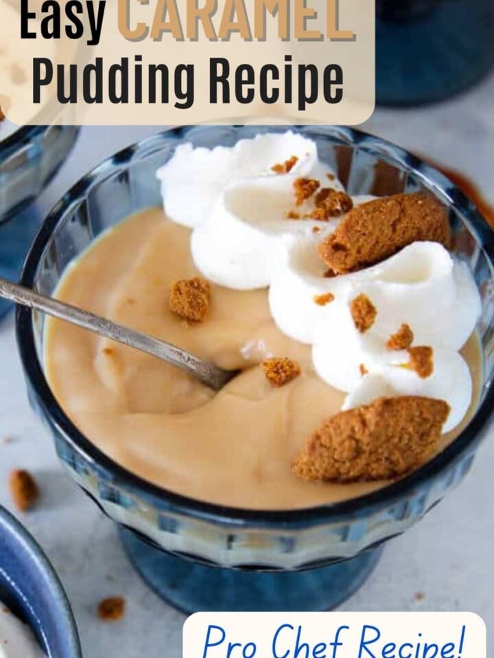 Spoon dipping into thick caramel pudding in a blue cup.