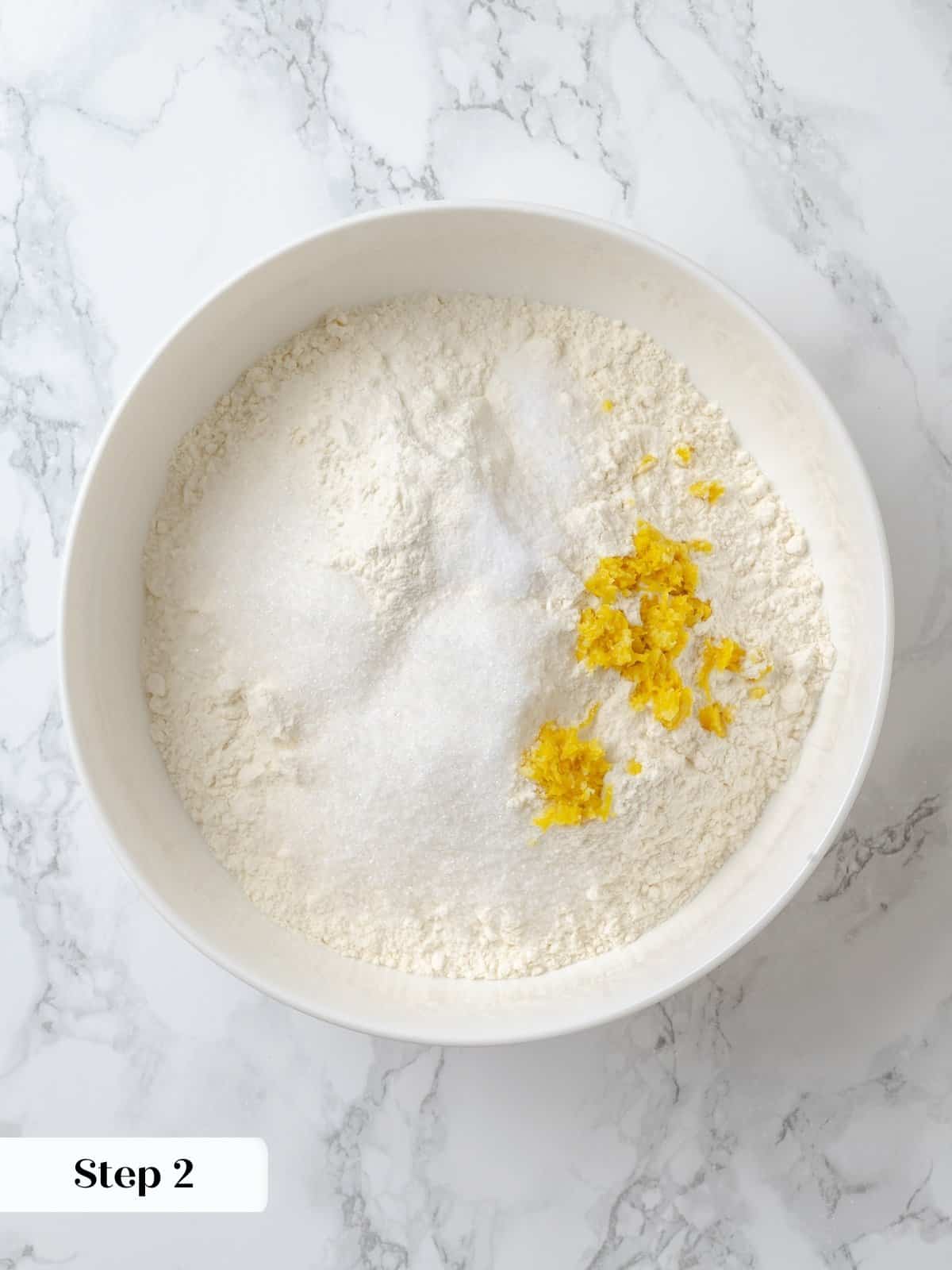 Blending dry ingredients evenly to prep for shortcake dough.