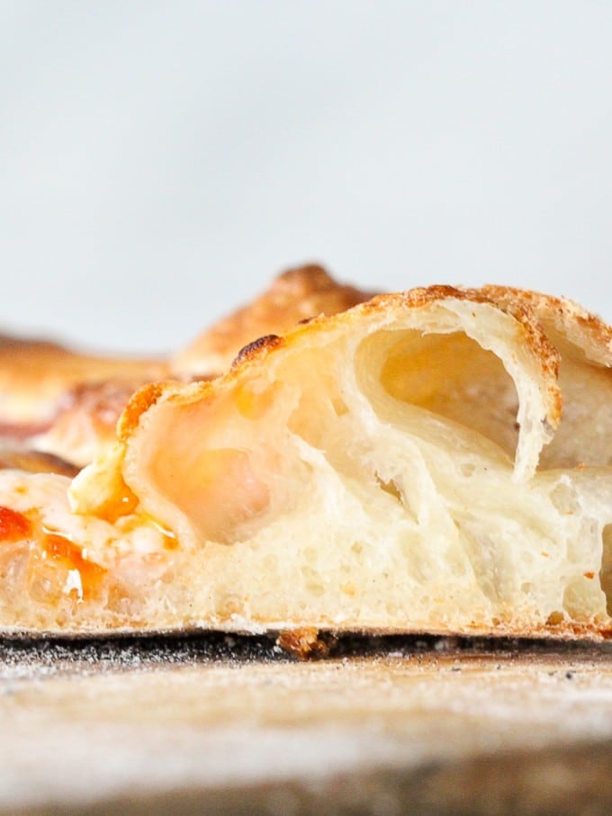 Crisp and airy sourdough crust with large bubbles.
