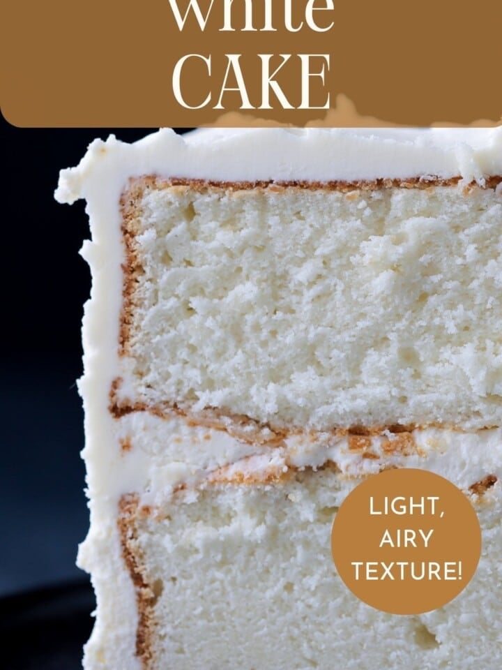 Fluffy white cake slice being served.