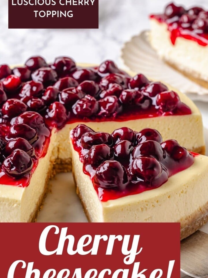 Homemade cherry cheesecake with thick pie filling on top and a buttery graham cracker crust.
