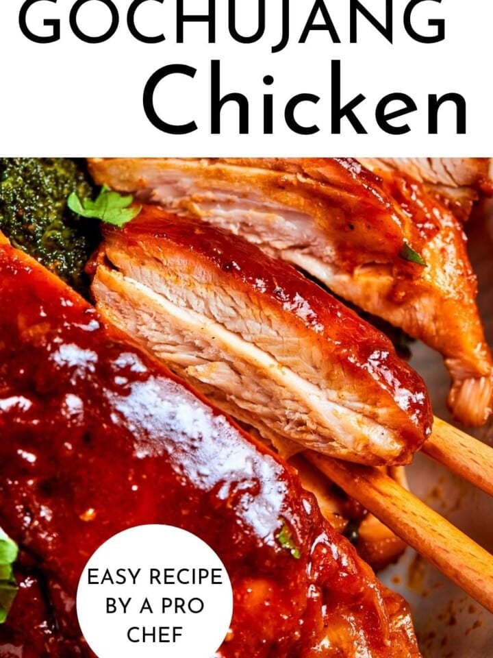Gochujang chicken with mushrooms and bok choy served in a thick, sticky red sauce.