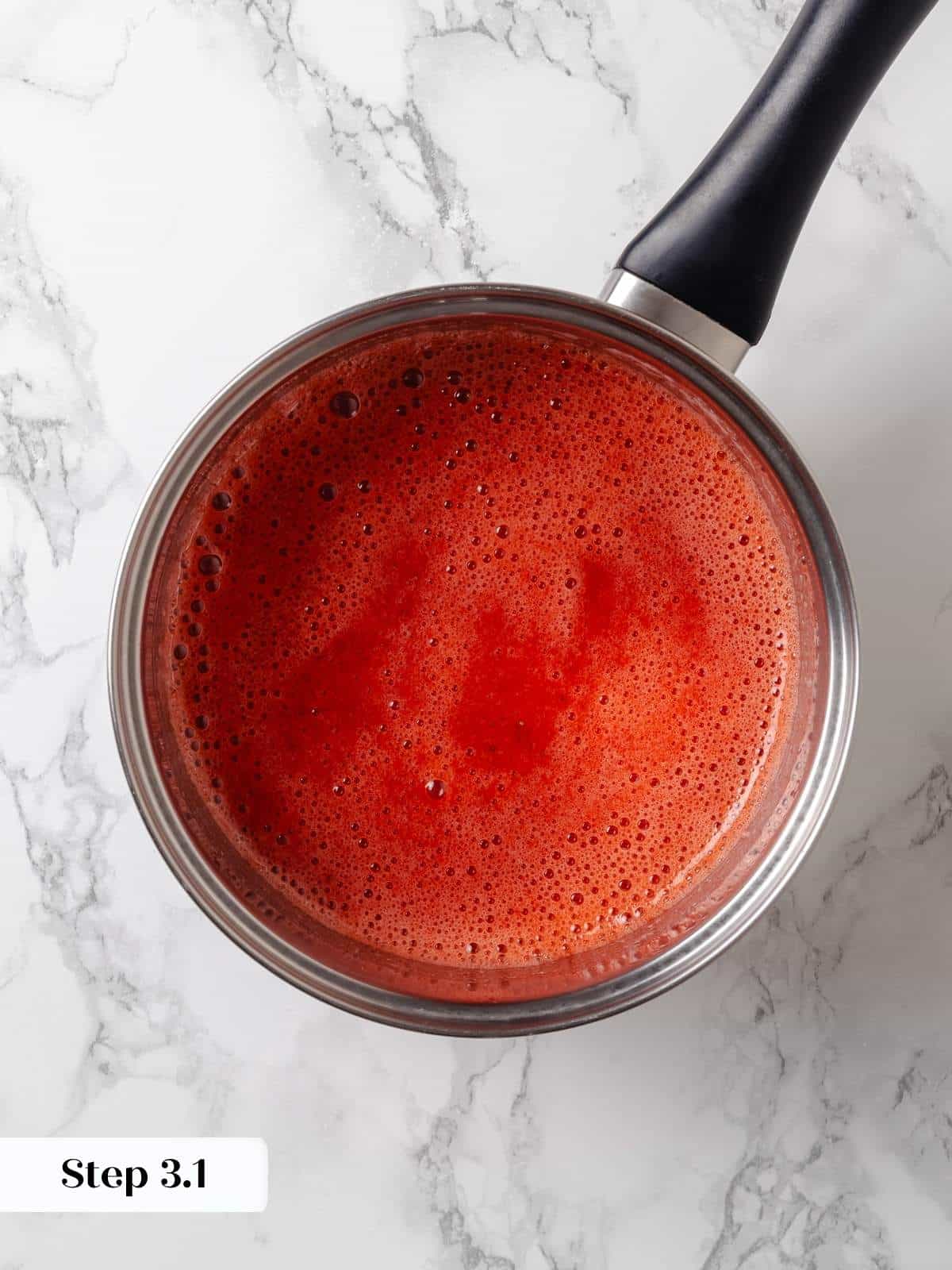 Liquid cornstarch mixture added to simmering fruit to set the jam texture.