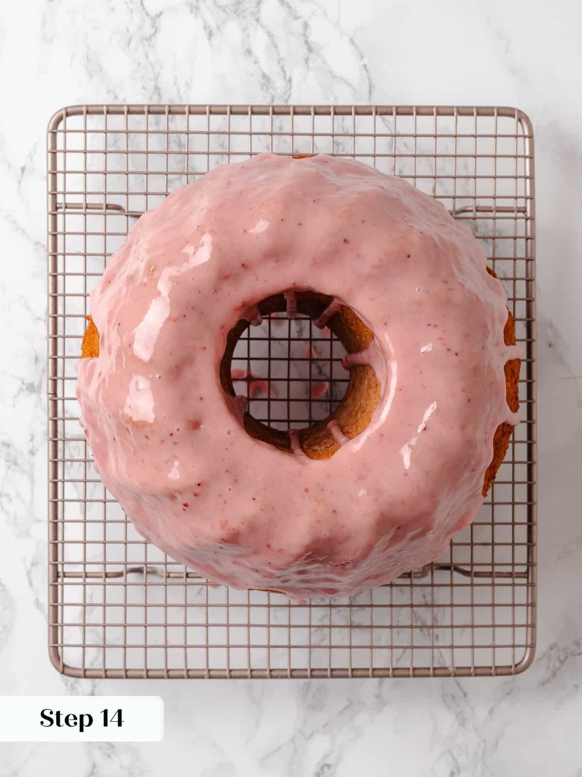 Fully baked pound cake on a wire rack, freshly glazed and ready to set.