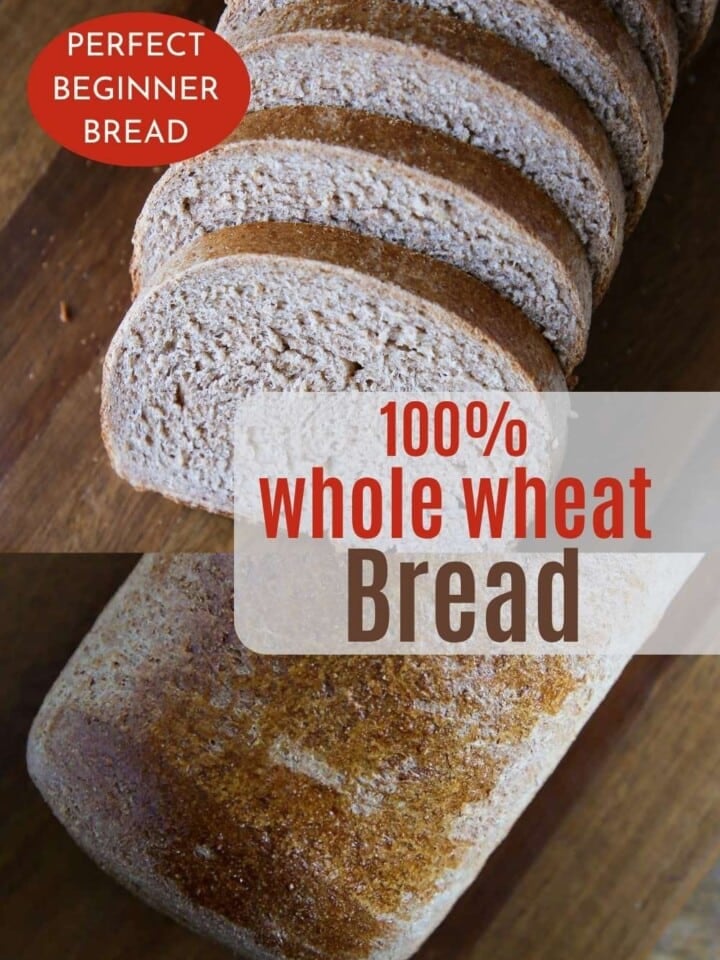 Thick slices of homemade wheat bread stacked on a wooden cutting board.
