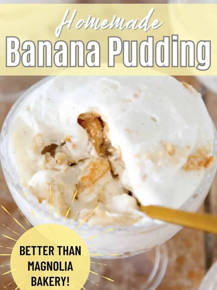 Cup of banana pudding with a spoonful showing the layers of banana and Nilla wafers.