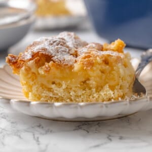 Center of gooey butter cake shown with buttery filling layered over the yeasted cake base.
