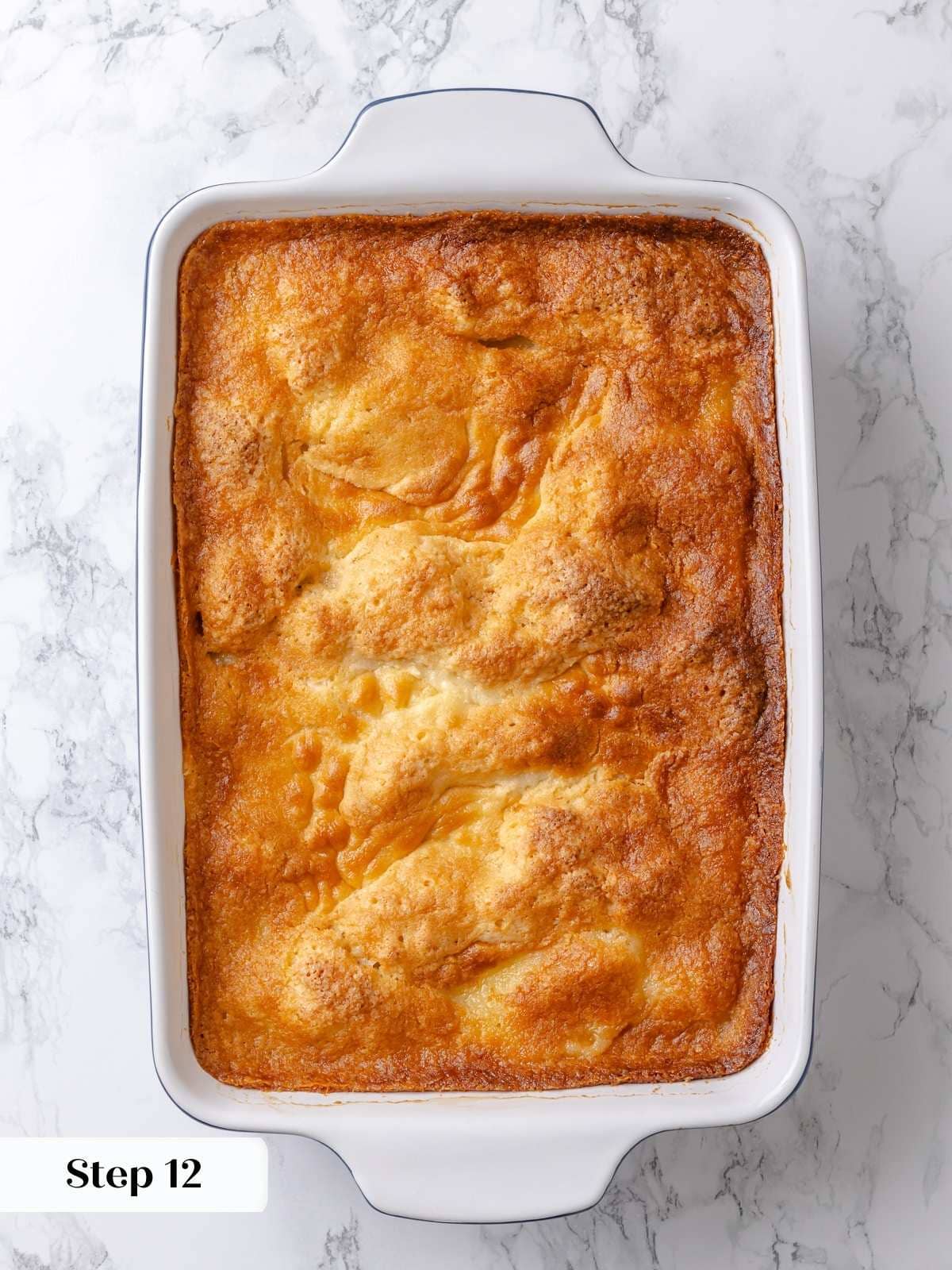 Finished gooey butter cake baked to golden brown with puffed edges and soft center.