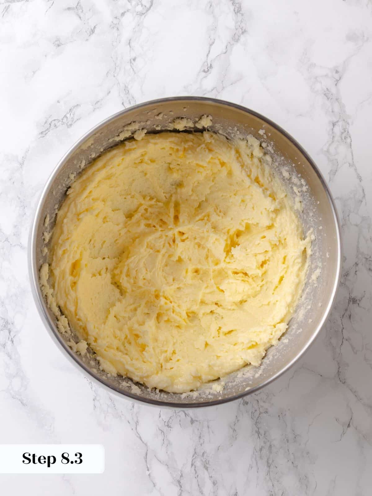 Egg is mixed into the creamed butter and sugar, creating structure for the batter.
