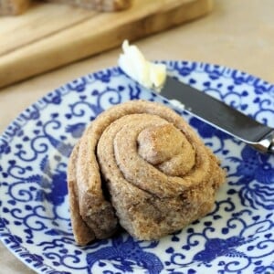 One freshly baked roll shown solo, with crisp edges and a soft, slightly domed top.