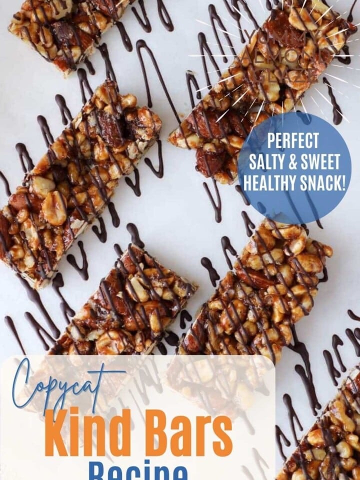 Homemade KIND bars drizzled with dark chooclate arranged on parchment with text that reads perfect salty and sweet healthy snack.