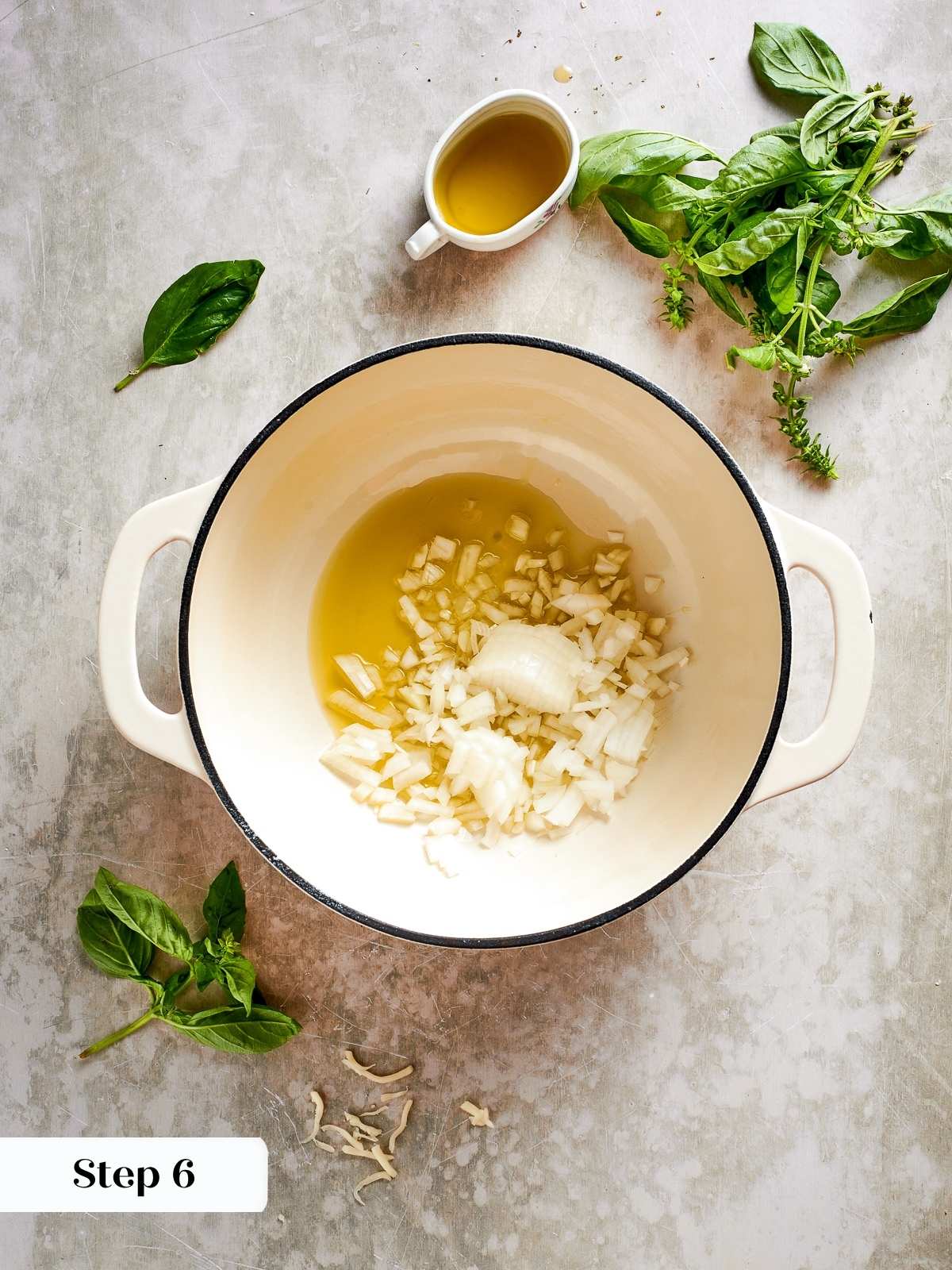 Diced onions and garlic sizzling in olive oil in a skillet as the base flavor.