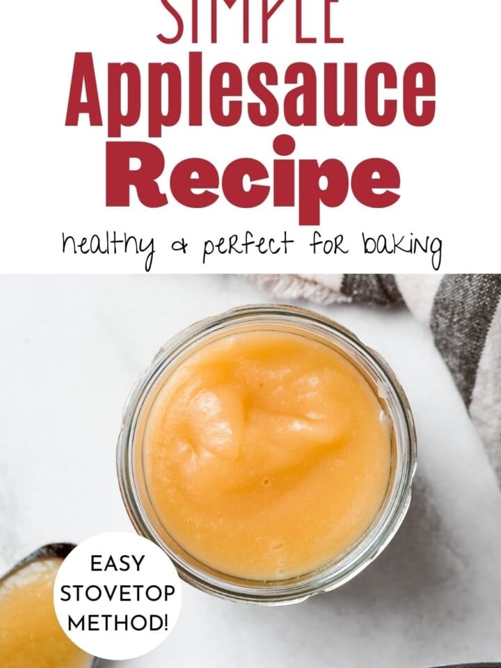 Homemade applesauce stored in mason jars, surrounded by apples for autumn inspiration.