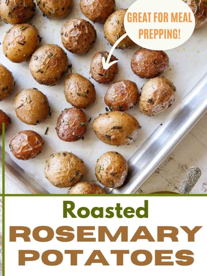 Golden roasted rosemary potatoes on a baking sheet with text that reads great for meal prepping.