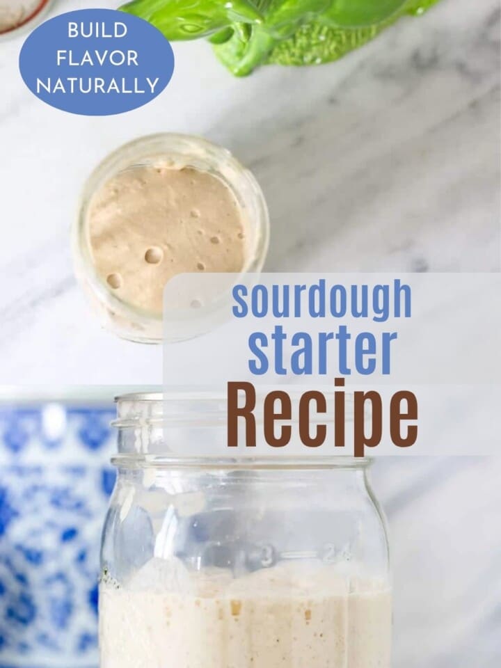 Active sourdough starter doubling in size with visible air pockets throughout the jar.