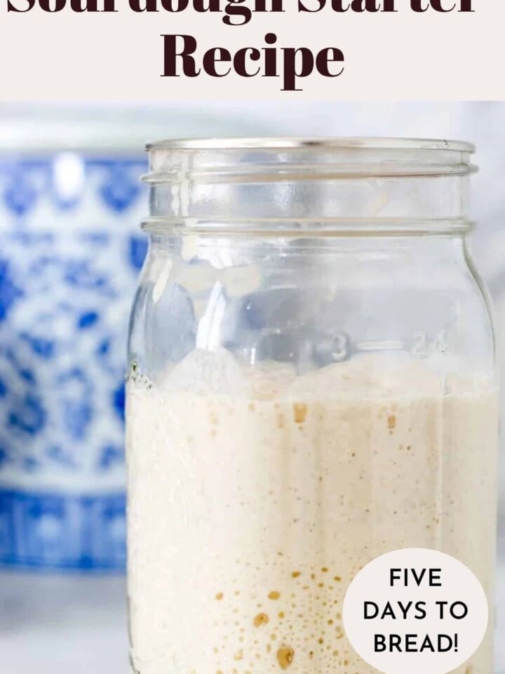 Jar of sourdough starter bubbling on the counter.