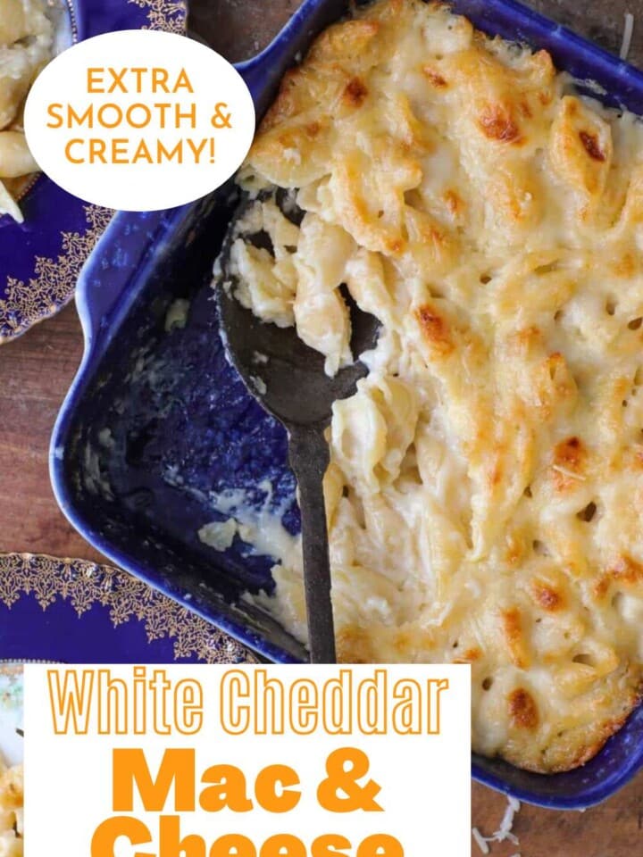 Smooth and creamy white cheddar macaroni and cheese in a baking dish.