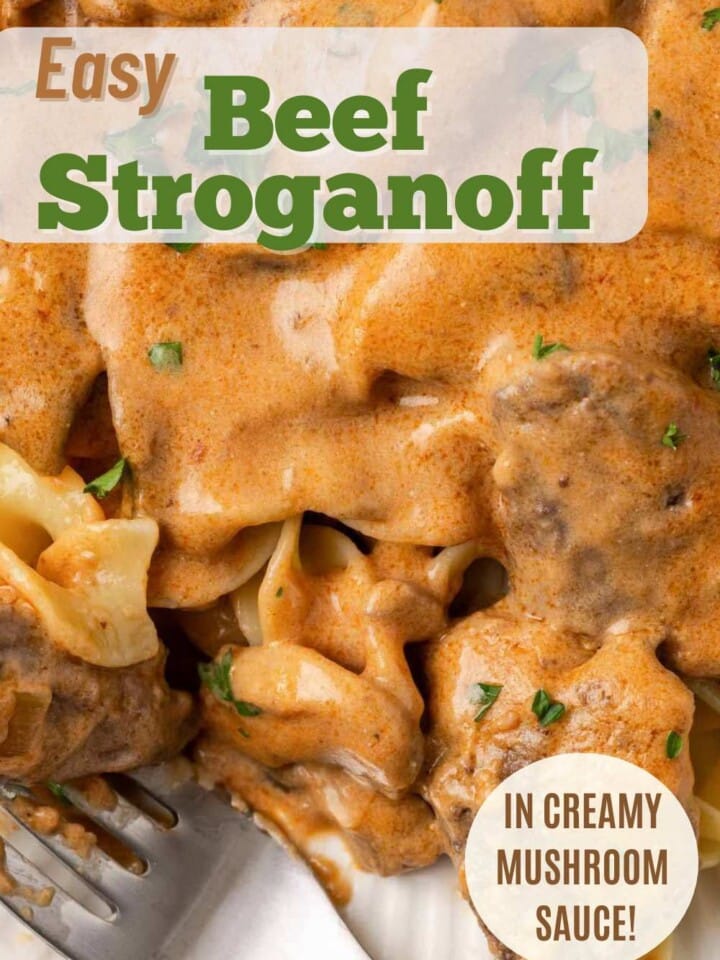 Beef stroganoff in a creamy mushroom sauce garnished with parsley.