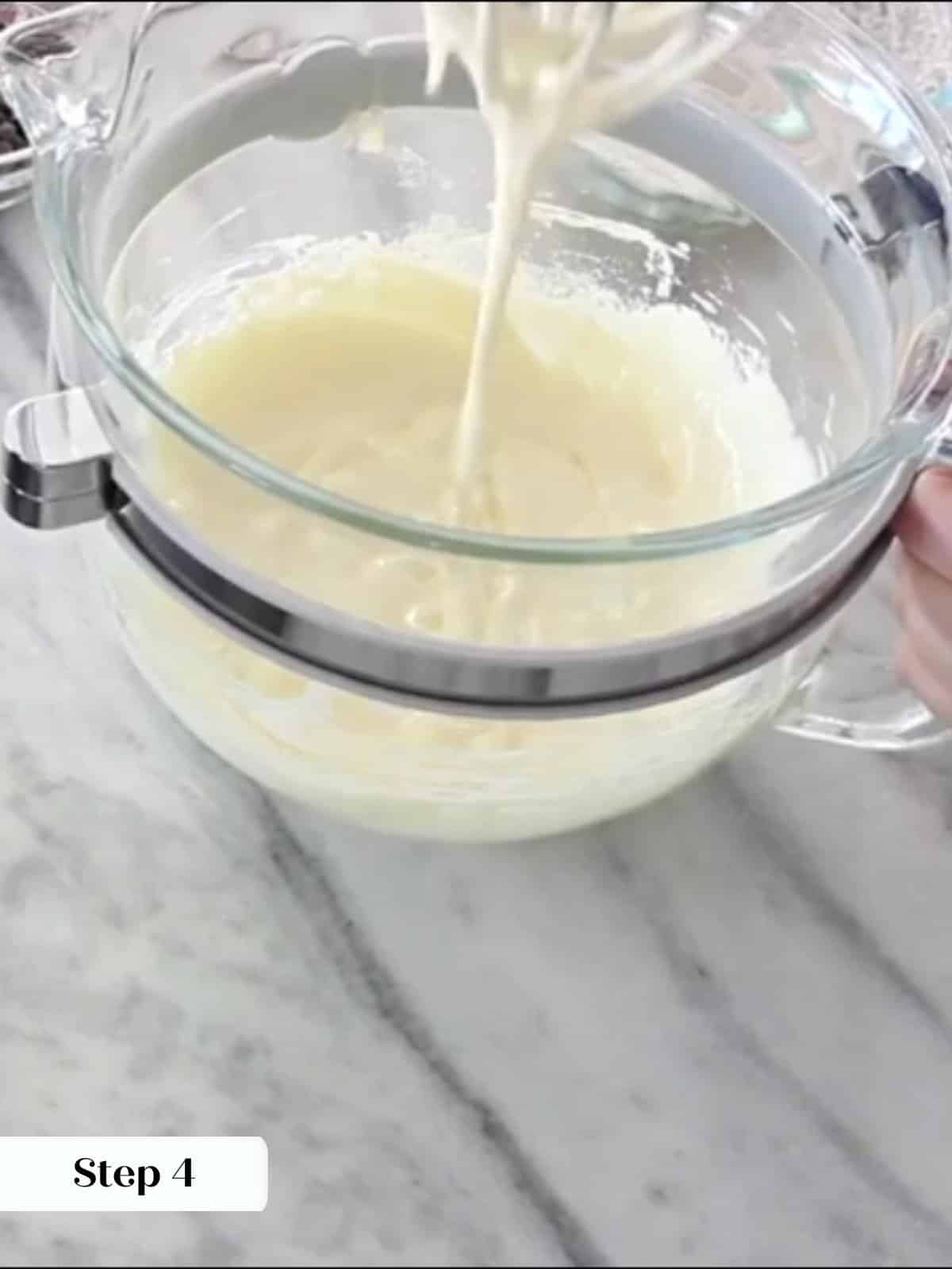Whipped egg mixture showing ribbon stage, indicating sufficient aeration for brownies.