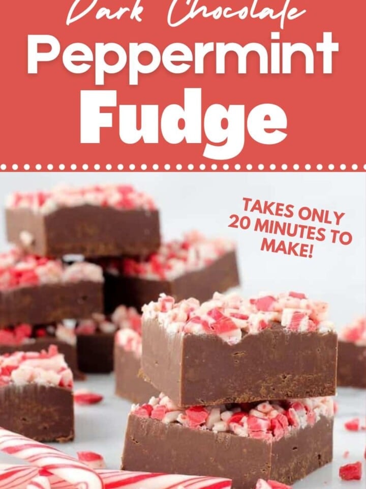 Stack of dark chocolate peppermint fudge squares topped with crushed peppermint pieces.