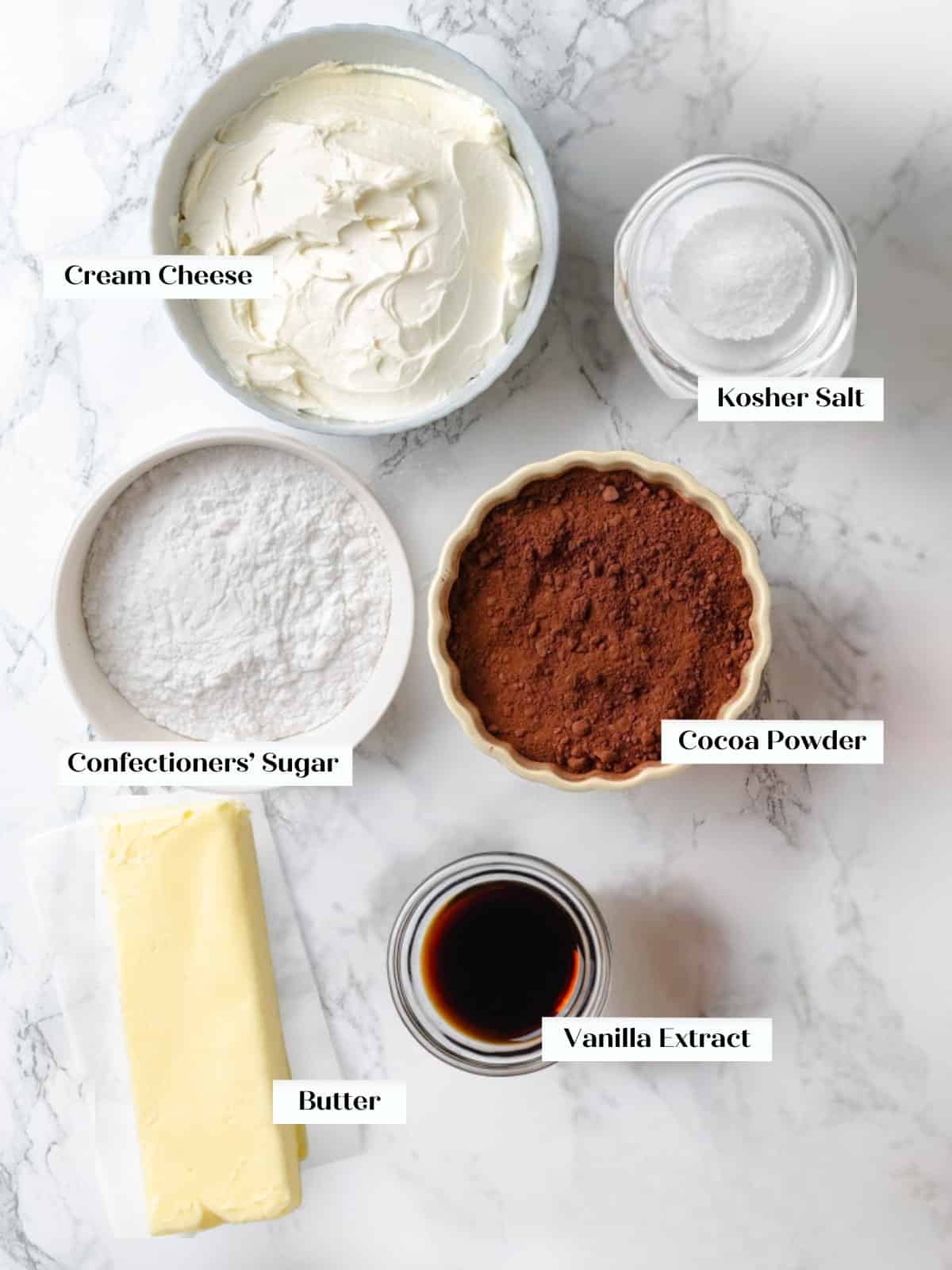 Baking ingredients prepared for making chocolate cream cheese frosting at home.