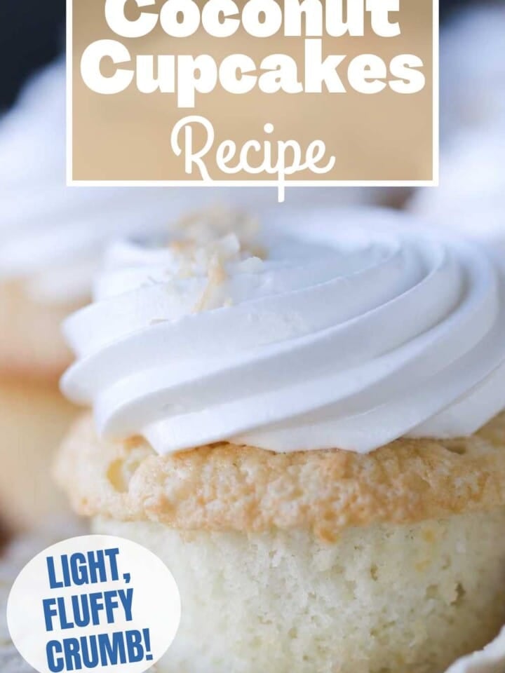 Soft white coconut cupcake topped with fluffy marshmallow meringue frosting and toasted coconut flakes.