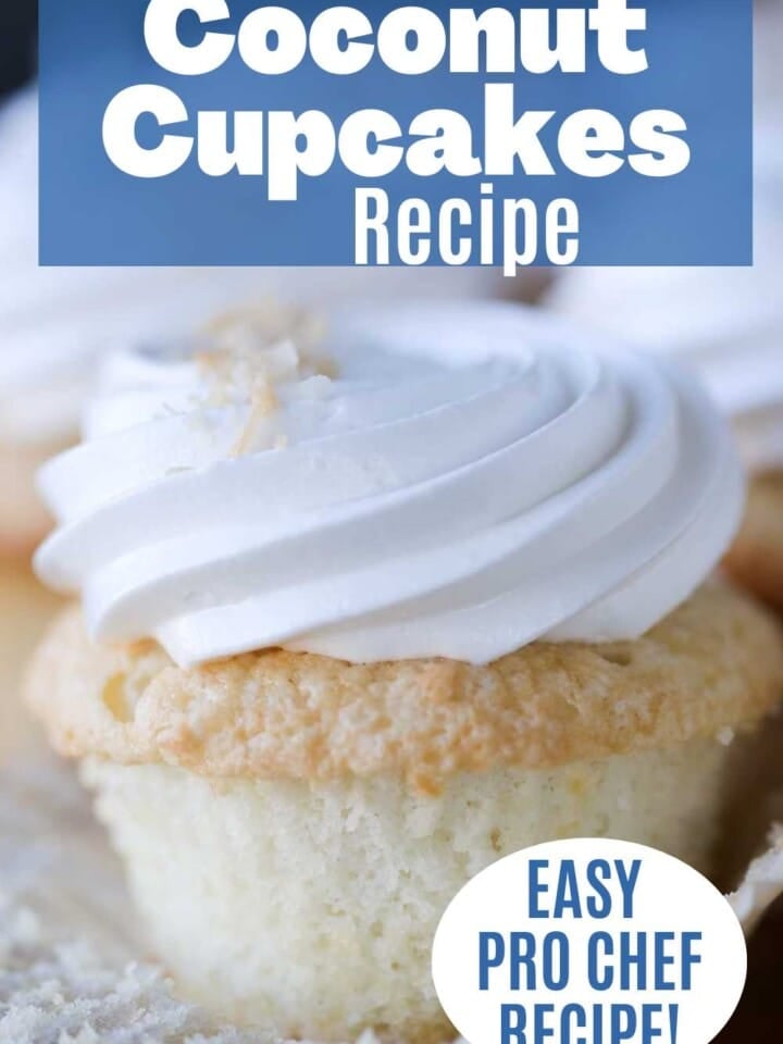 Soft white coconut cupcake topped with fluffy marshmallow meringue frosting and toasted coconut flakes.