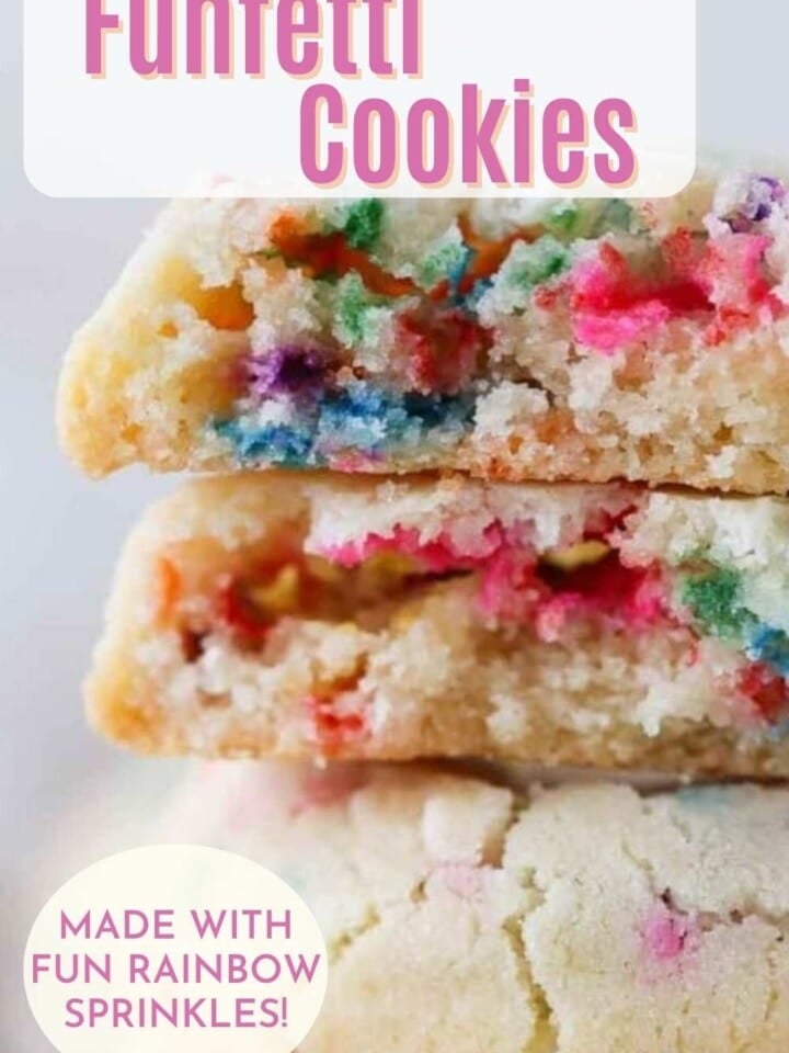 Stack of colorful funfetti cookies with soft chewy center exposed.
