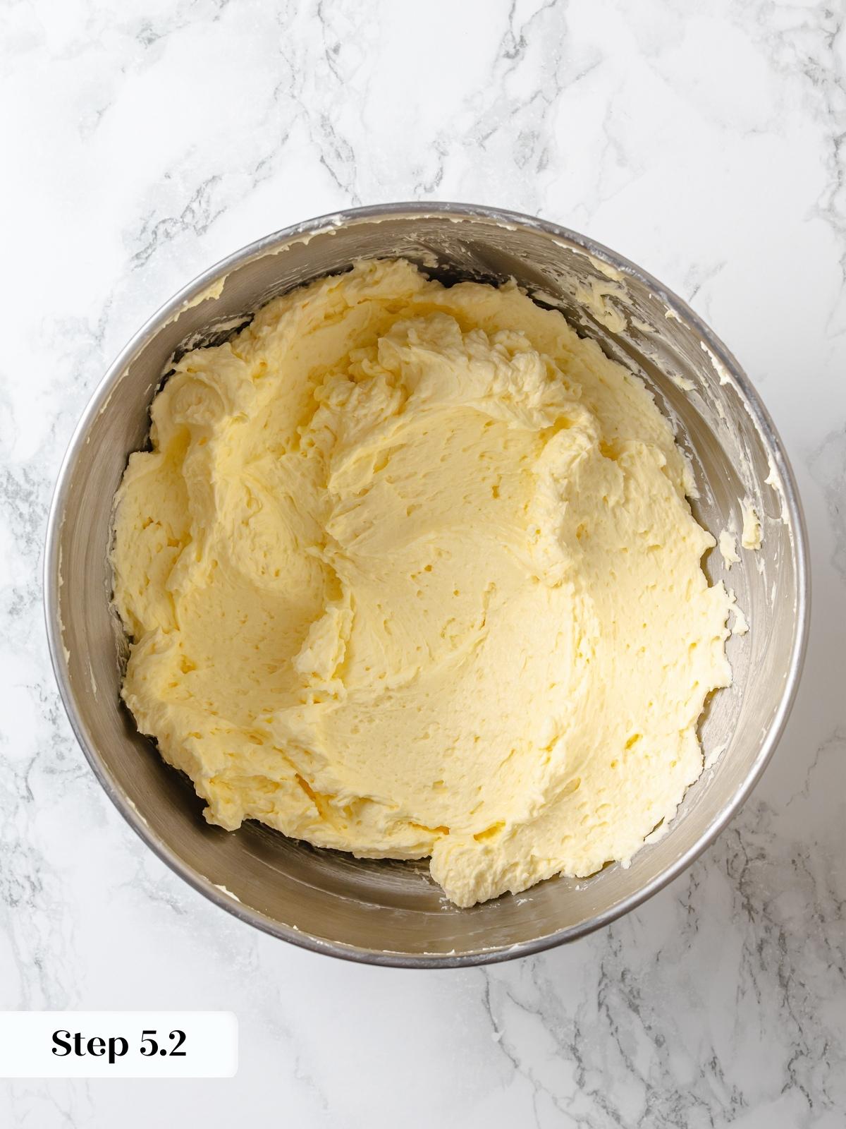 finished lemon Swiss meringue buttercream for bright citrus flavor.