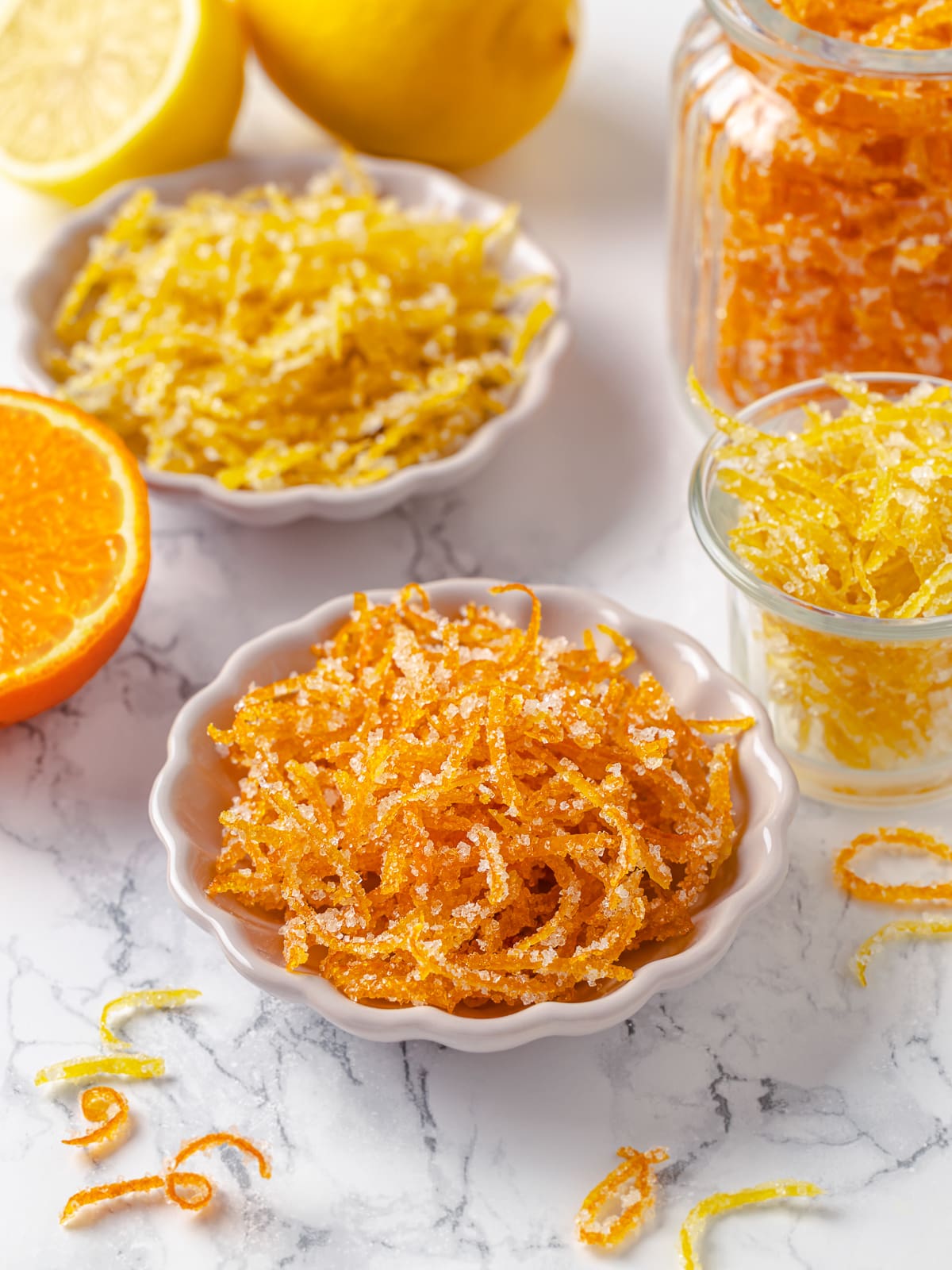 candied orange and lemon peel showing contrast in color and shape.