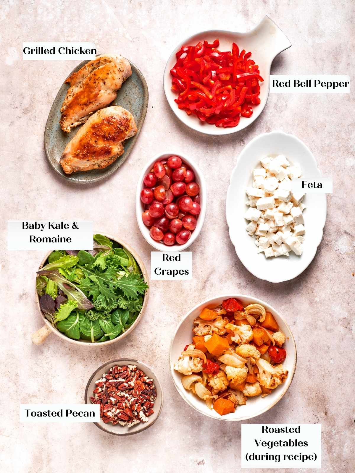 Salad ingredients prepared separately before combining with roasted vegetables.