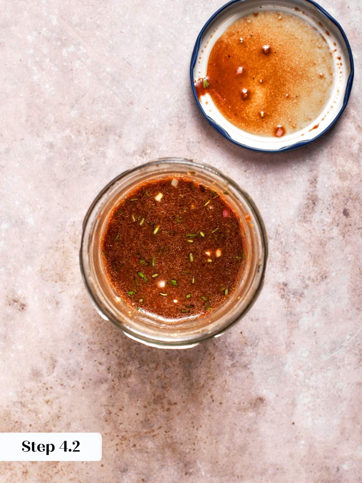 Lemon balsamic vinaigrette shaken in glass jar until emulsified.