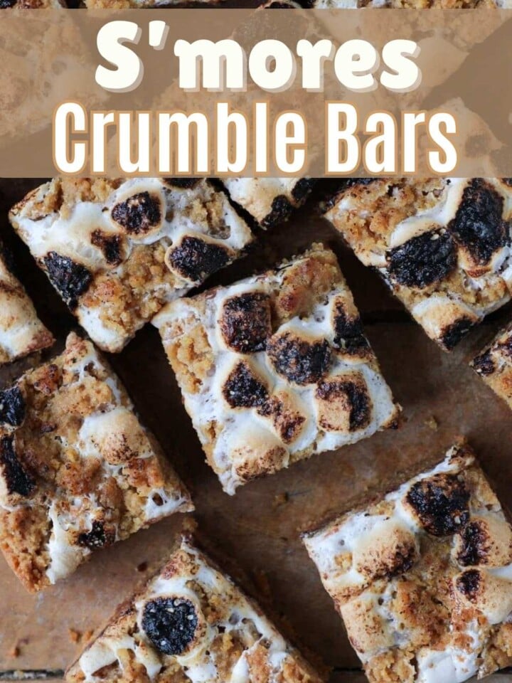 S'mores crumble bars with graham cracker crumble crust topped with melty toasted marshmallows.
