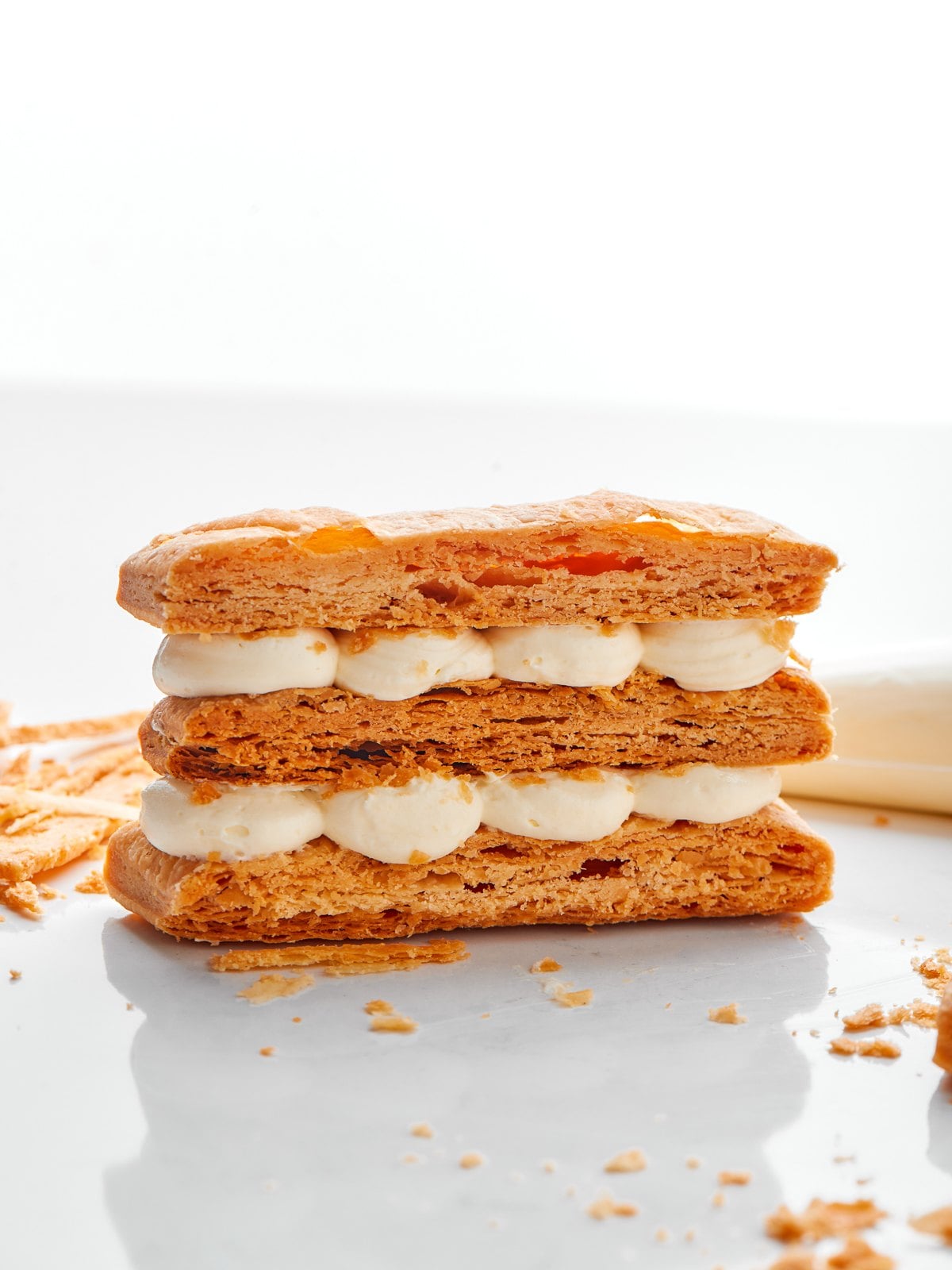 Baked puff pastry showing crisp golden layers with even rise and flaky texture.