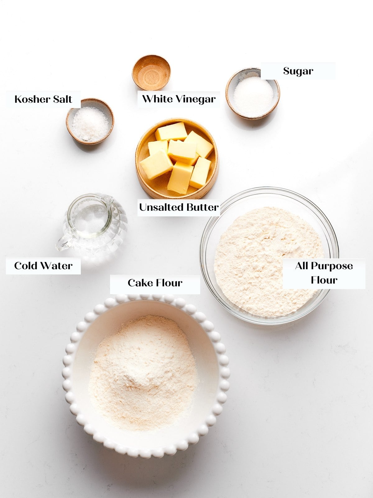 Measured puff pastry ingredients arranged neatly on countertop before beginning preparation.