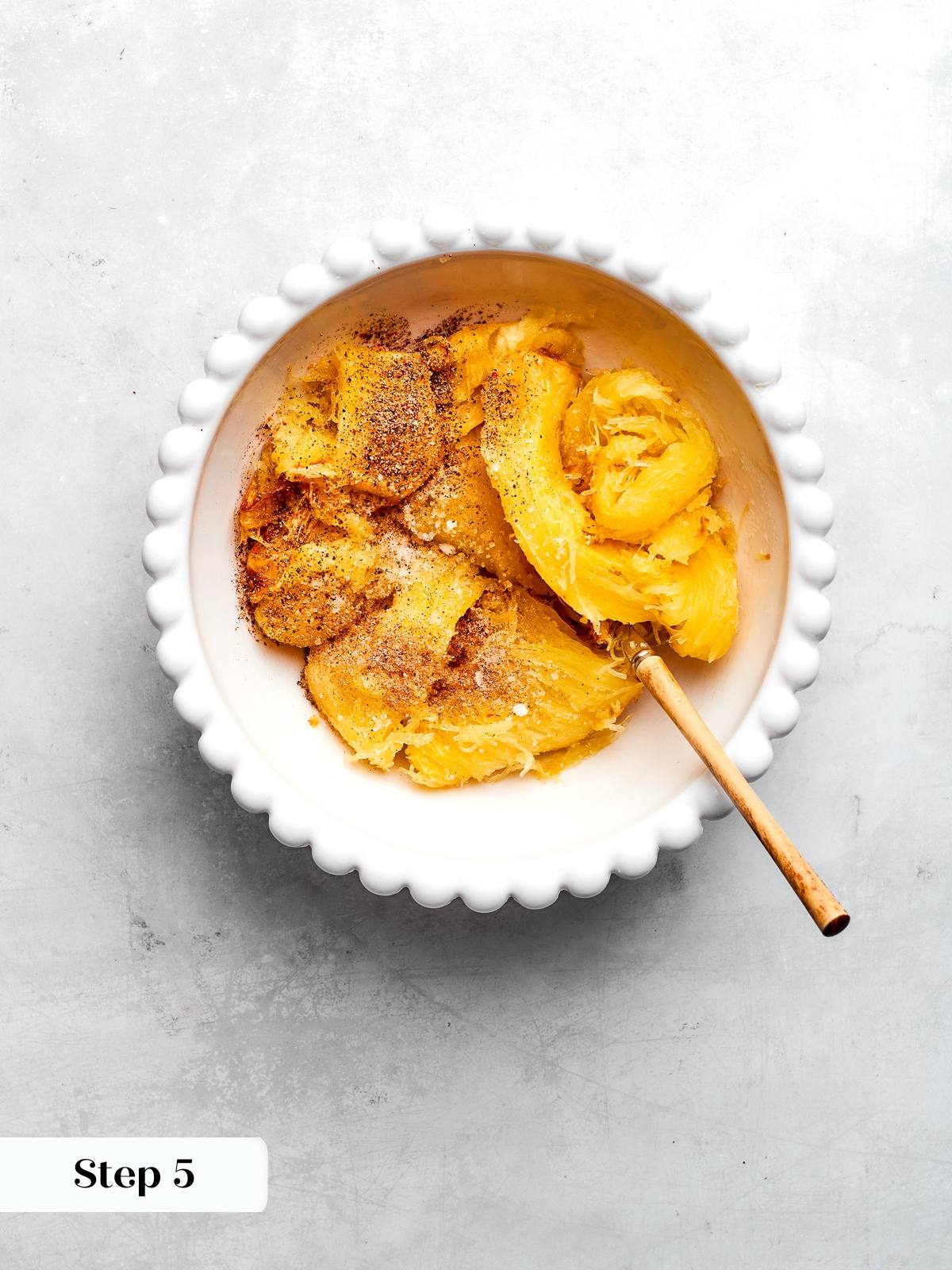 Shredded spaghetti squash tossed with olive oil, salt, pepper, and nutmeg.