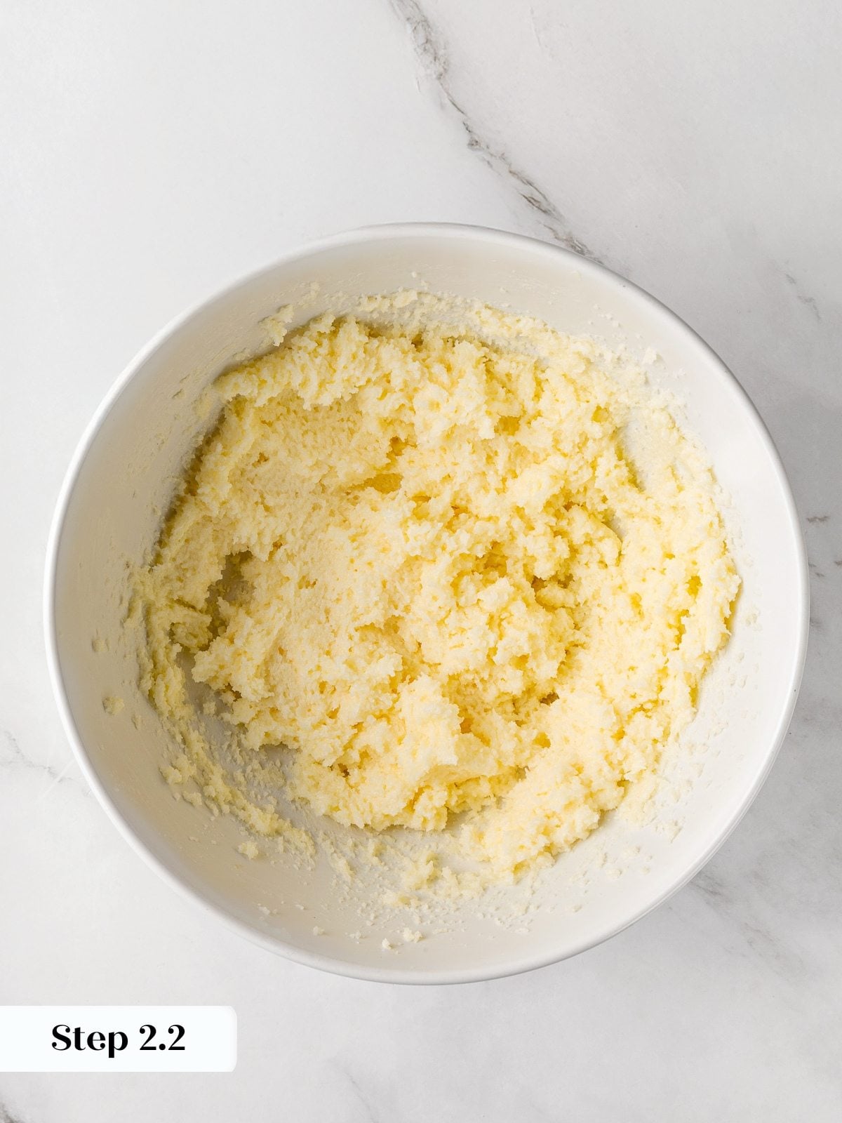 Butter and sugar creamed together until light and fluffy for cookie dough.