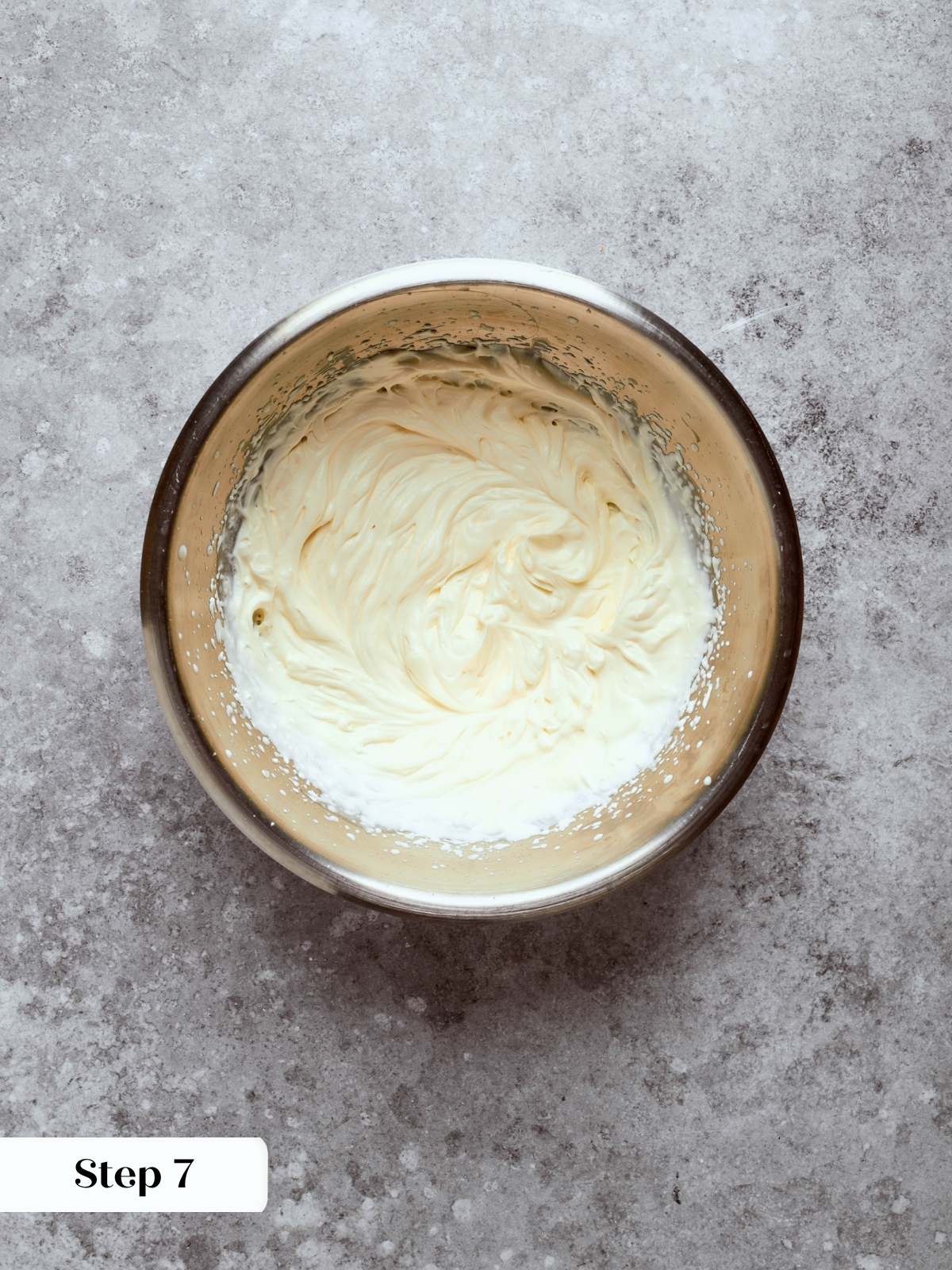 creme legere whipped cream in silver bowl.