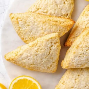 Lemon scones with golden brown edges and lightly crisp exterior from proper baking.