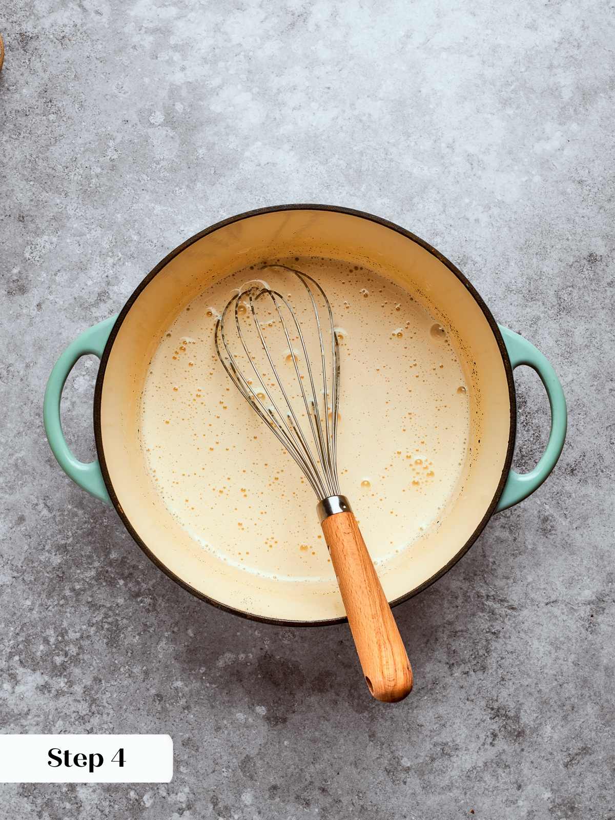 Combined ingredients before cooking, showing liquid mixture of milk, eggs, and sugar.