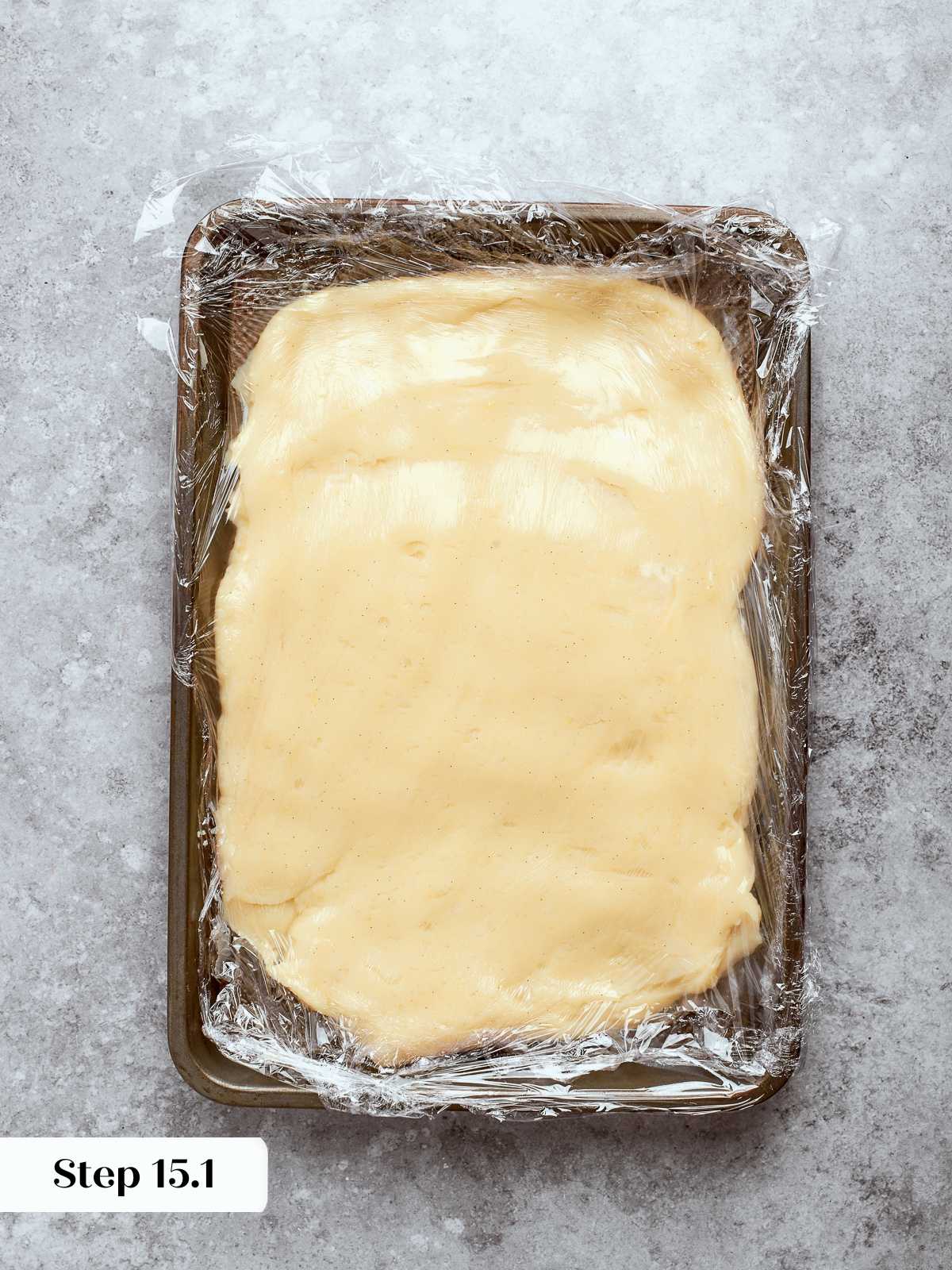 Pastry cream fully chilled and set, covered and ready for spreading into tart shell.