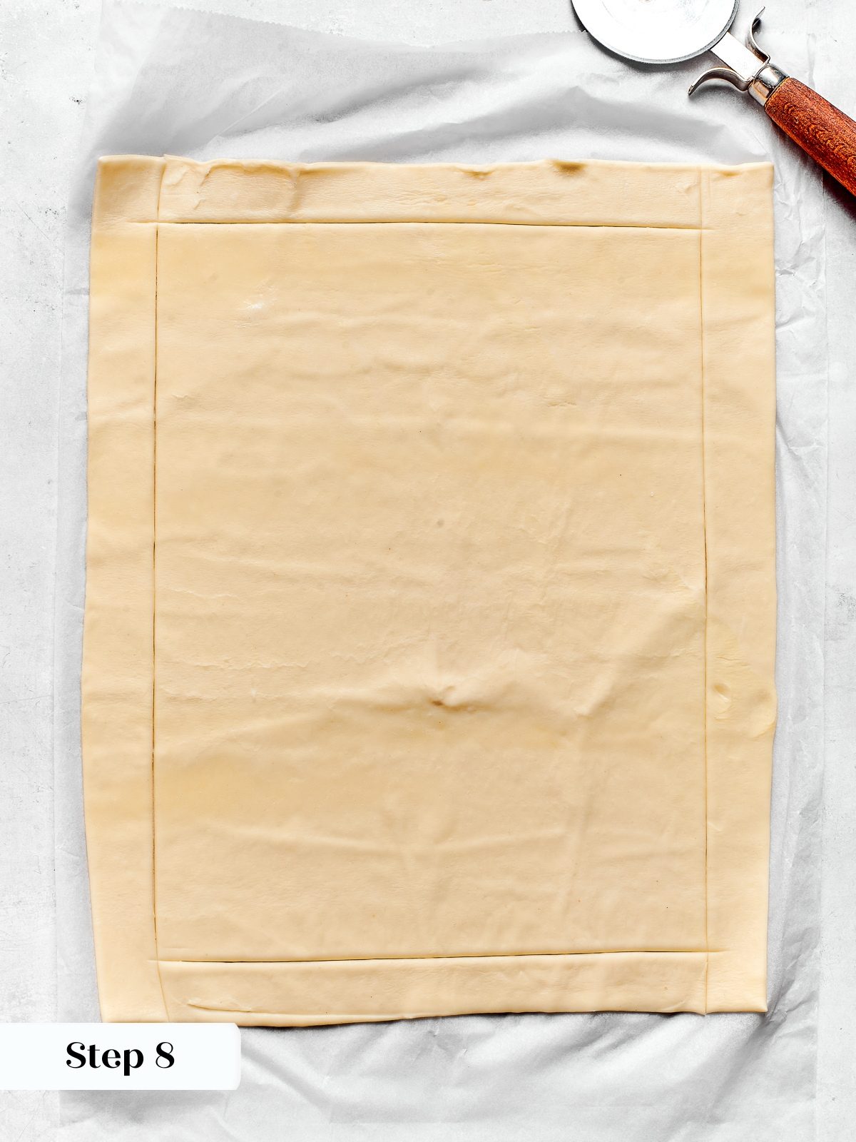 Puff pastry sheet cut into rectangular base and strips for tart border.